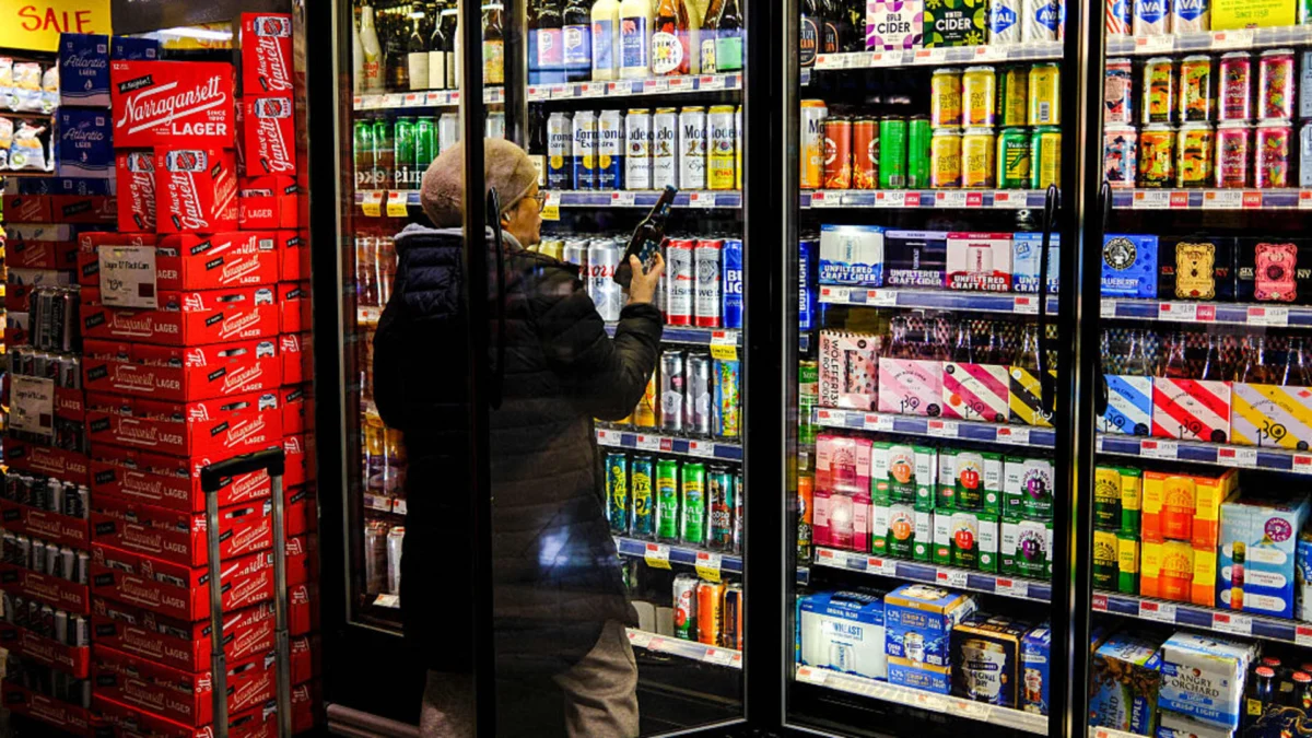 A customer shops for beer in a supermarket in New York on Jan. 22, 2026. Charly Triballeau | AFP | Getty Images
