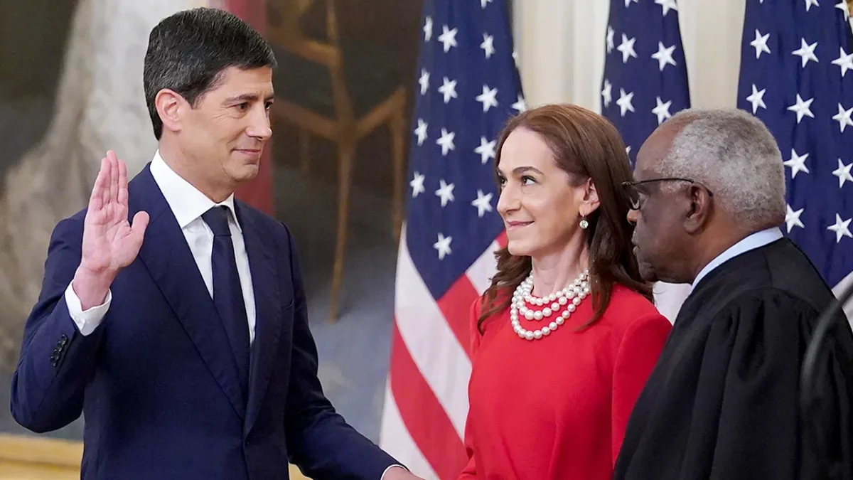 Kevin Warsh is sworn in as the new Chair of the Federal Reserve by Supreme Court Justice Clarence Thomas during a ceremony at the White House.