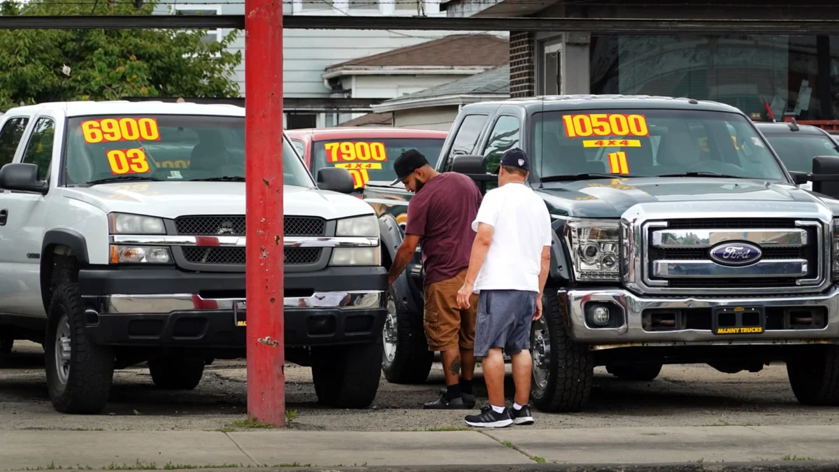 Used cars are offered for sale at a dealership on July 11, 2023 in Chicago, Illinois. Scott Olson | Getty Images