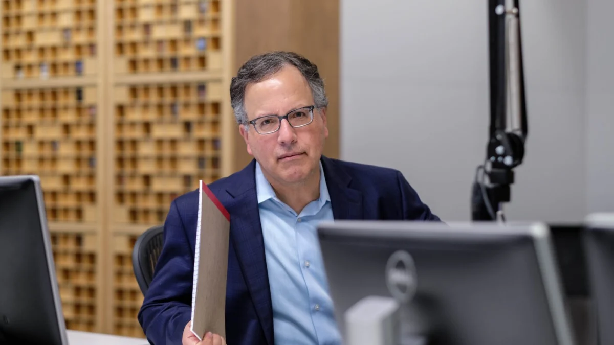 NPR has laid off 10 journalists and bought out at least 18 others as part of a restructuring effort to save $8 million.