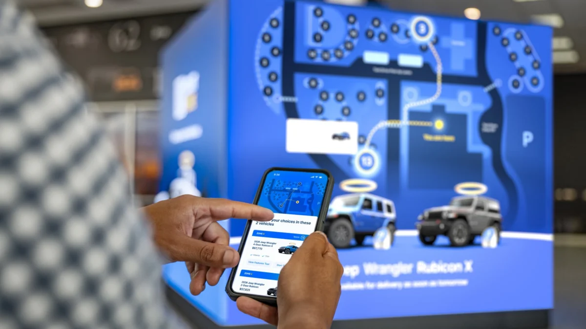 Carvana’s Dallas playground for new-vehicle sales features brand-themed zones and a test-drive-centric layout.