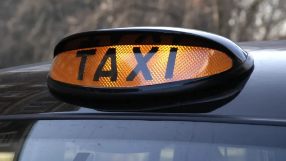 A Worcester taxi stands ready for a new fare schedule as council reviews adjustments