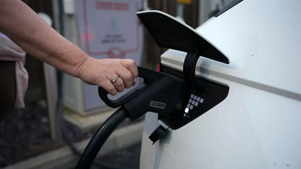 A car showroom with electric vehicles as the UK weighs changes to its EV sales mandate.
