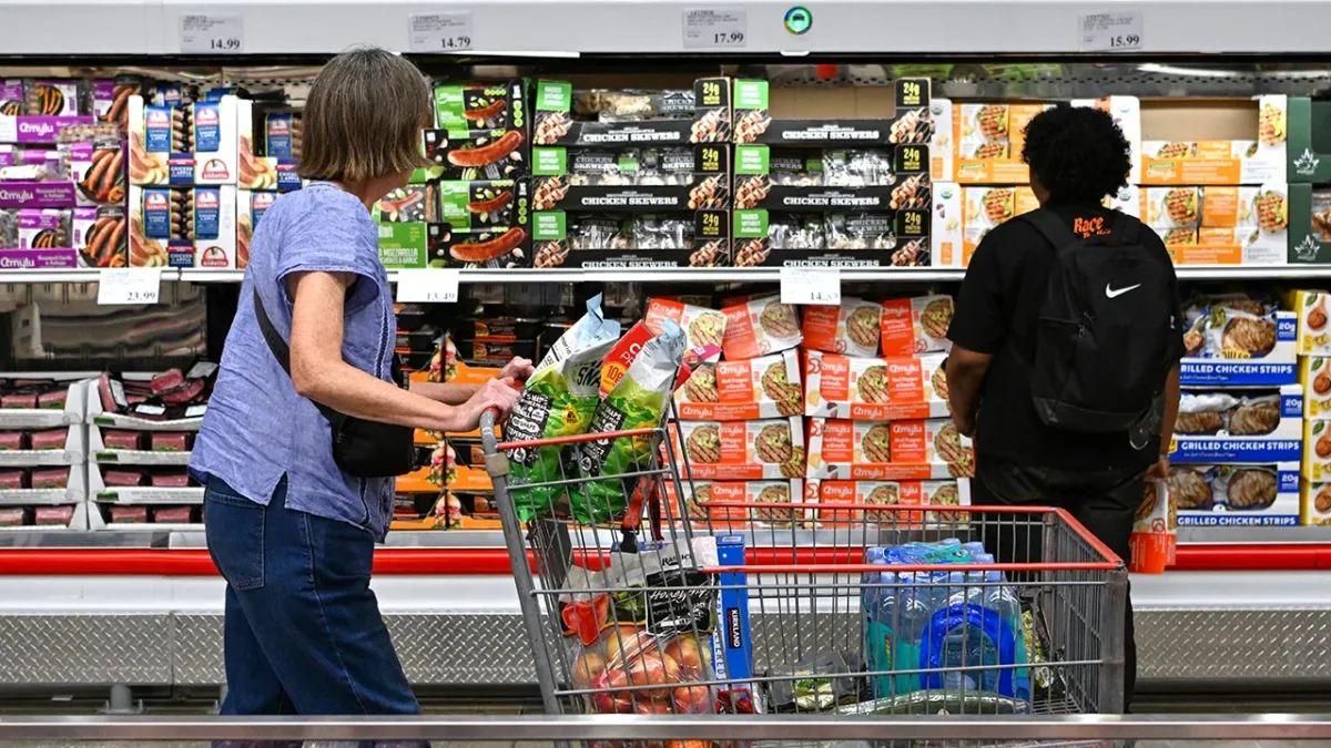 A shopper reviews groceries in Arlington, Virginia, as inflation remains elevated.