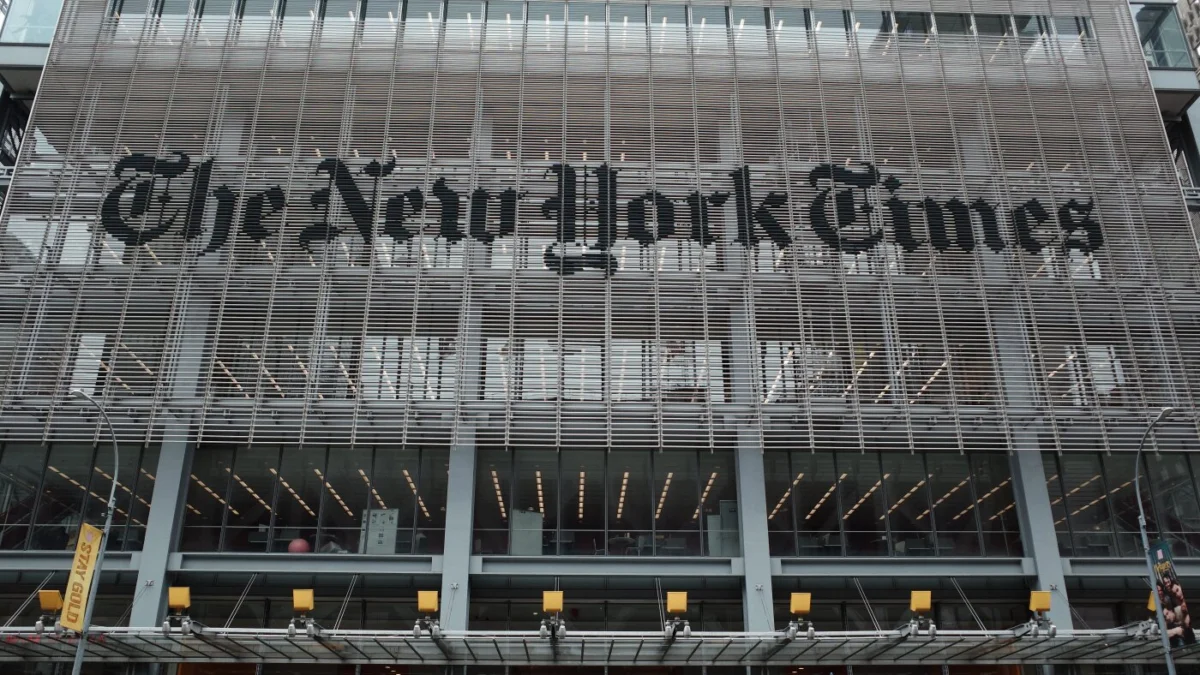 The New York Times building and newsroom activity amid coverage of Air Force One reporting and related DOJ actions.