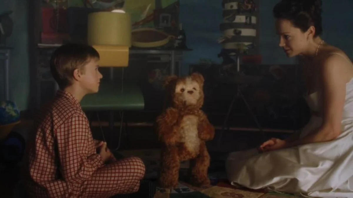 A child interacts with an AI-enabled toy, illustrating the debate over AI in early childhood.