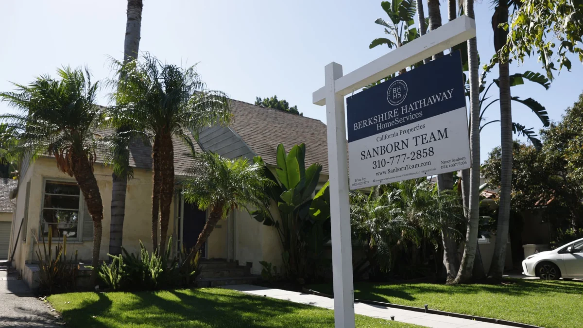 A for-sale sign in front of a Los Angeles home amid shifting buyer dynamics under new rental housing rules.