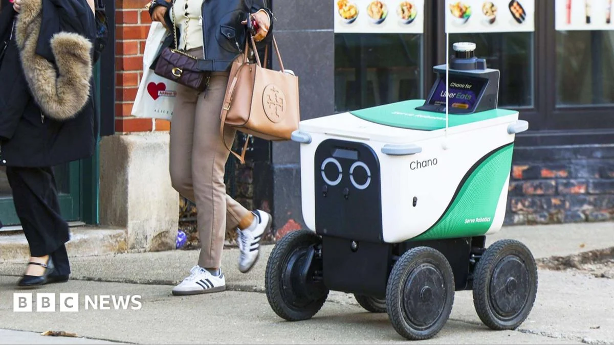 A delivery robot navigates a busy urban sidewalk, as cities weigh safety, access and regulation.